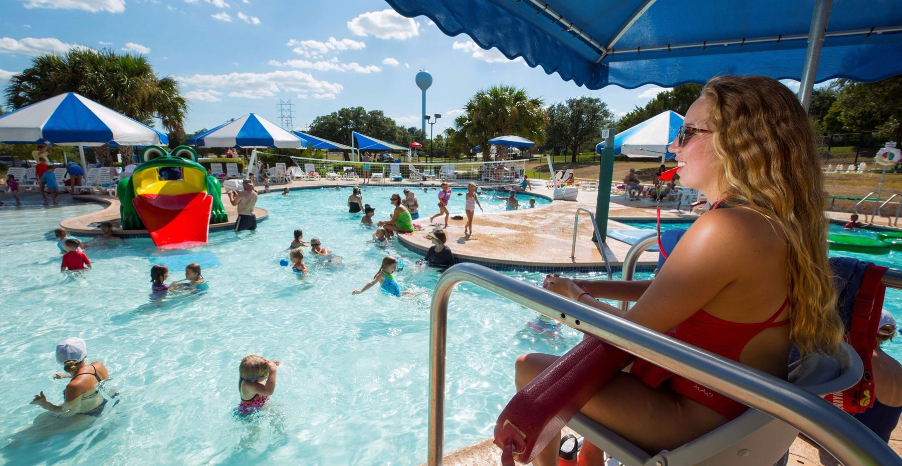 Community waterpark in Lakeway TX with residents enjoying the water and amenities.